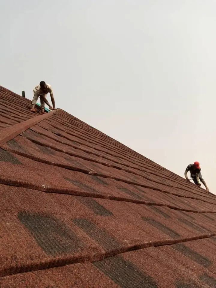 Installation team working on a roof